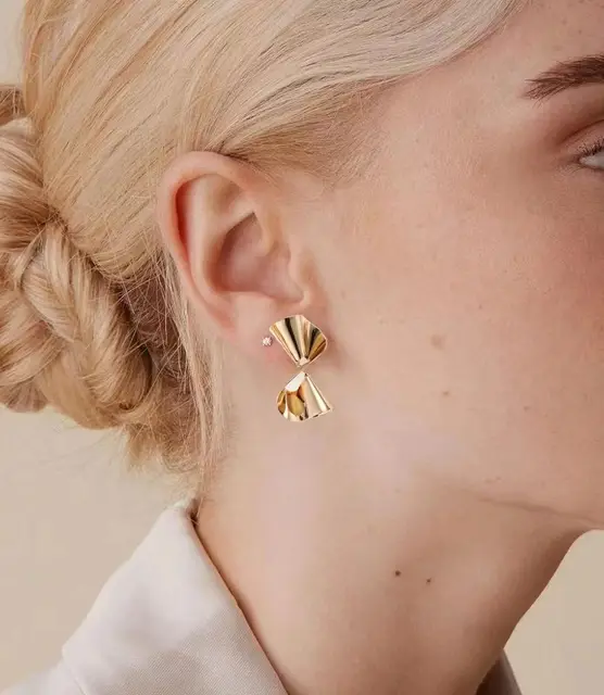 Boucles d'oreilles créoles rotatives en or 14 carats DAISY - Élégantes et hypoallergéniques
