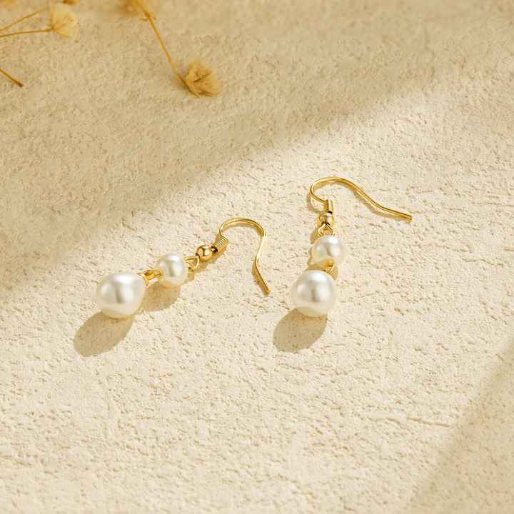 Boucles d'oreilles pendantes en perles plaquées or tendance